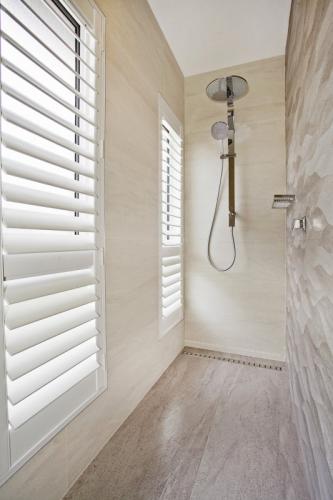 Somerset Curtains, Blinds, Shutters & Awnings - Swimm 3