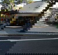 The Corner by McCaf - Qld Realsetate