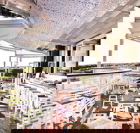 Bronze Kiosk - Qld Realsetate