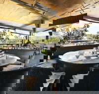 Pacific Pines Tavern - Petrol Stations