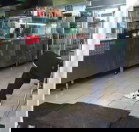 Tasty Rooster on Charcoal - Qld Realsetate