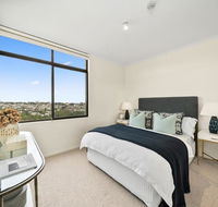 East Mirvac Building with Convenient Living - Renee