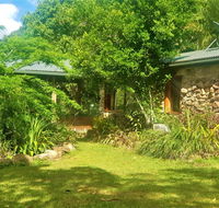 Palm Grove Rainforest Retreat - Petrol Stations