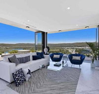 Stylish Penthouse with Views  Jacuzzi - Qld Realsetate