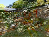 Palm Grove Rainforest Retreat