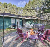 Eagle River Waterfront Home with Dock and Fire Pit