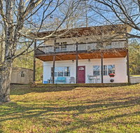Lakefront Delta Cottage with Views Canoe and Dock